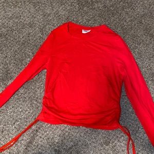 Red long sleeve top from ASOS! Very on trend! Brand new and never worn, no tags!